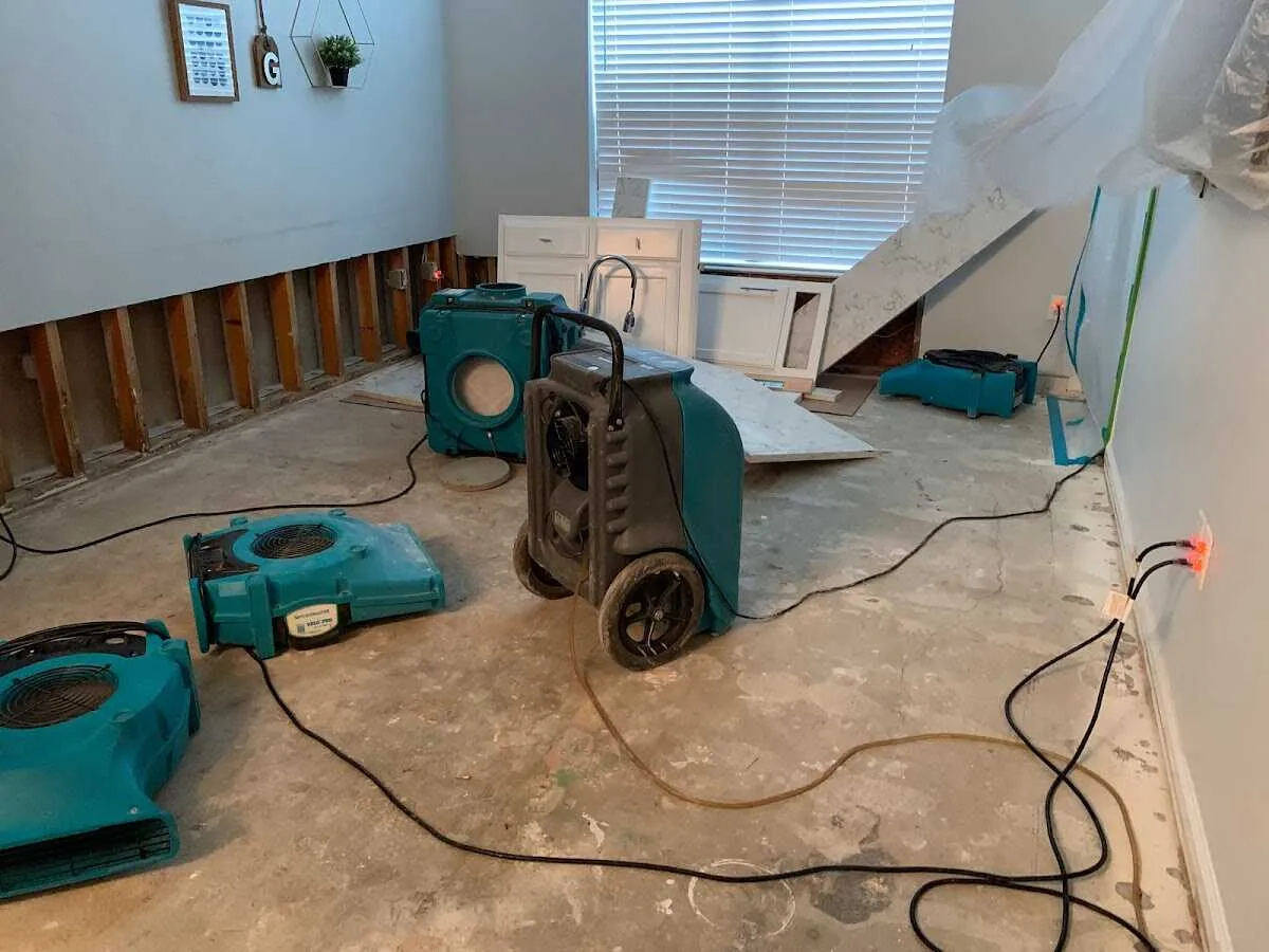 Dehumidifier in flood-cut room for Water Damage Restoration in Mandeville